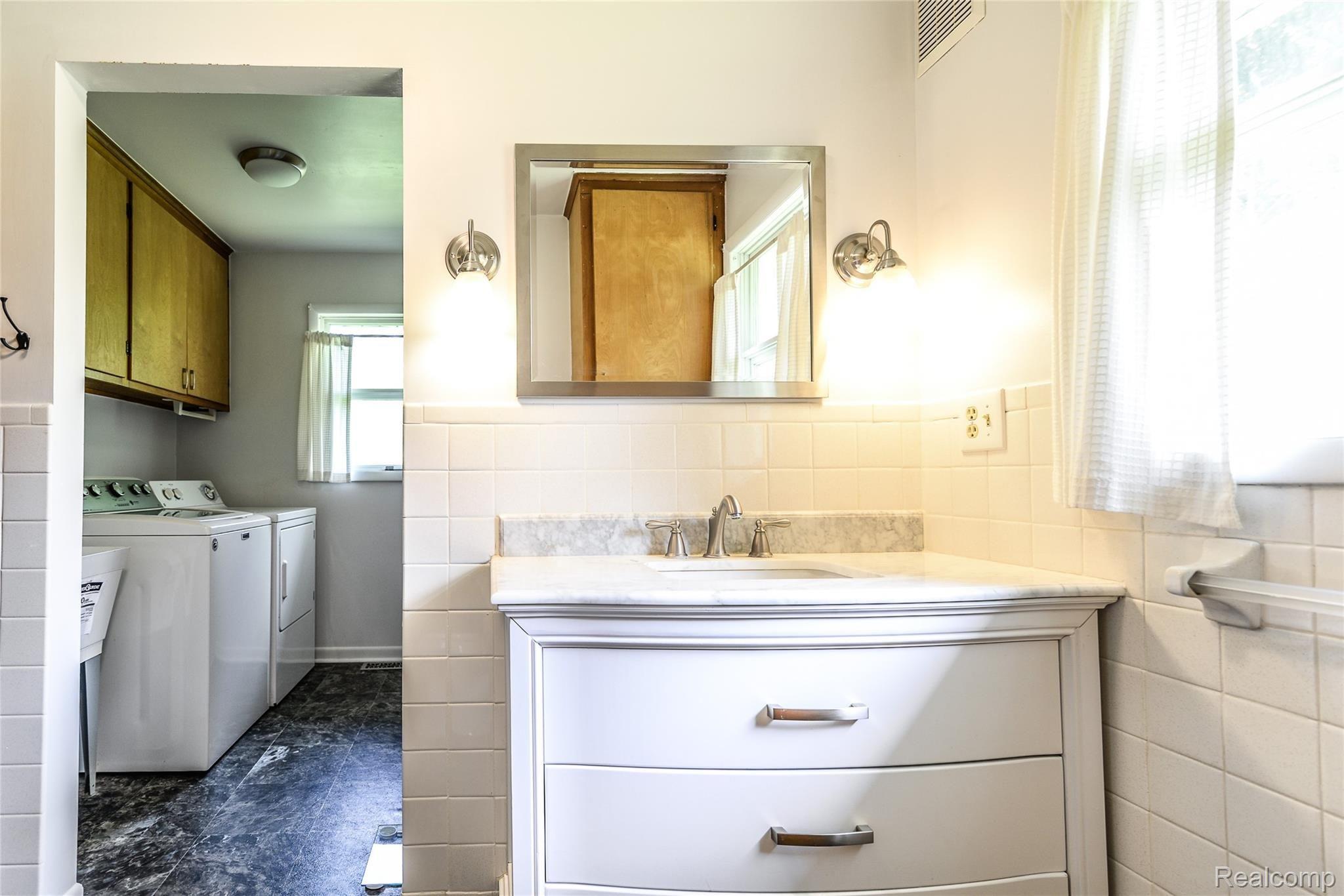 3855 Mason Road Howell, MI 48843 - Photo 17 of 28 First Floor Laundry off Master Bathroom