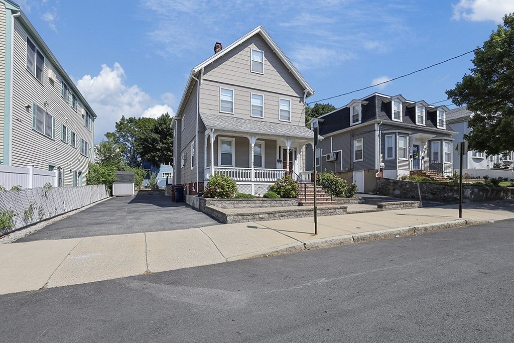 a view of a building with a street