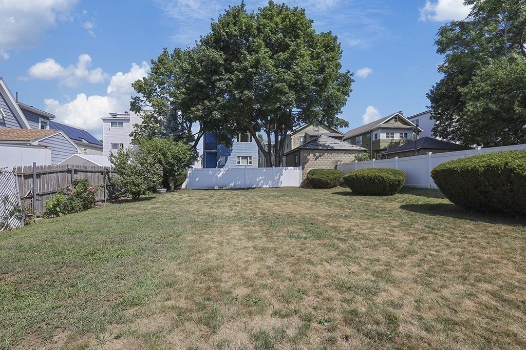61 Everett Street Everett, MA 02149 - Photo 19 of 19 a view of a backyard of the house