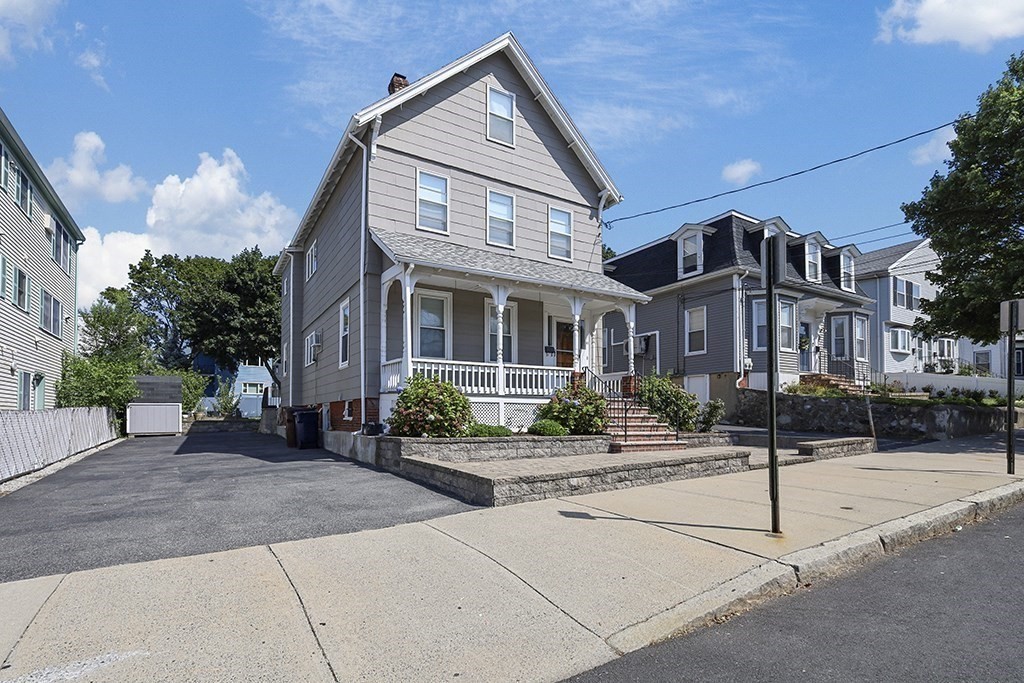 61 Everett Street Everett, MA 02149 - Photo 2 of 19 a front view of a building with street