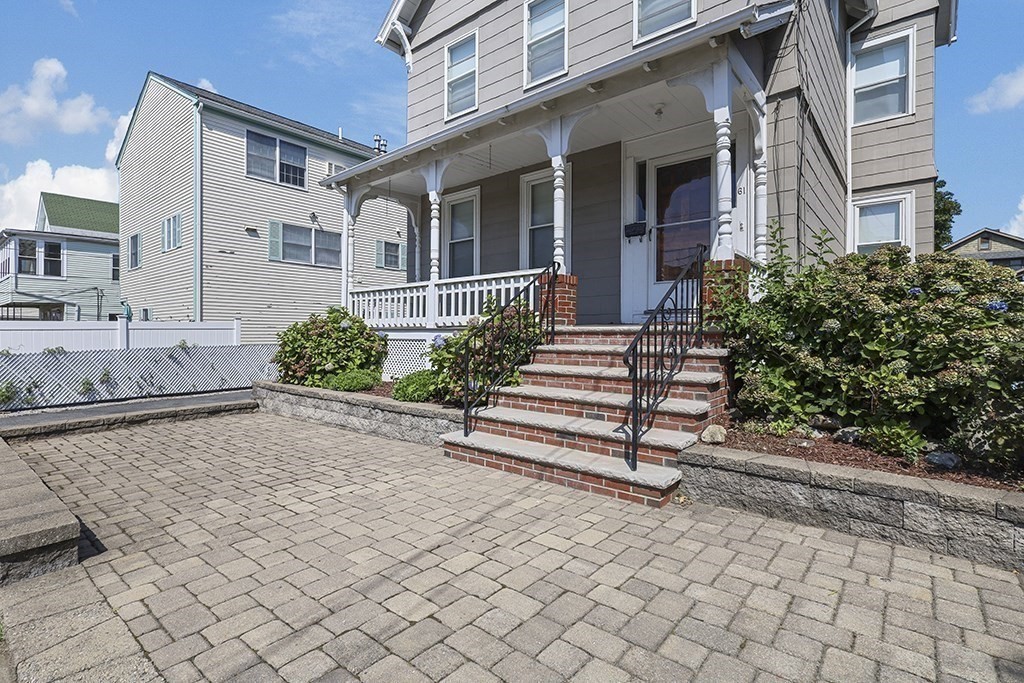 61 Everett Street Everett, MA 02149 - Photo 3 of 19 a view of a house with backyard and a garden