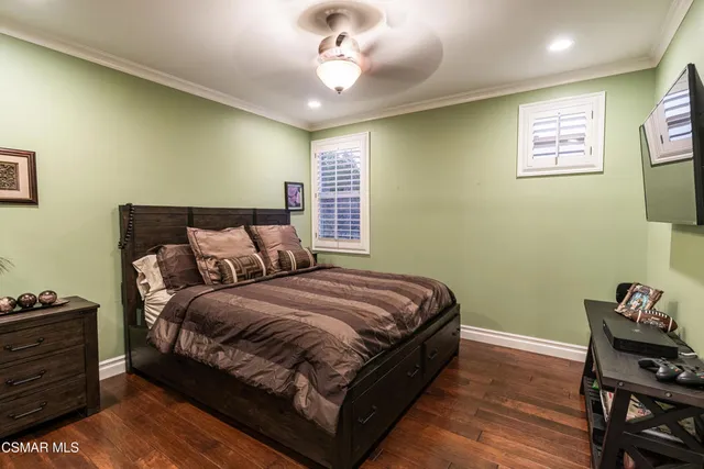 a bathroom with a sink double vanity granite and a mirror