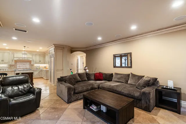 a living room with furniture and a couch