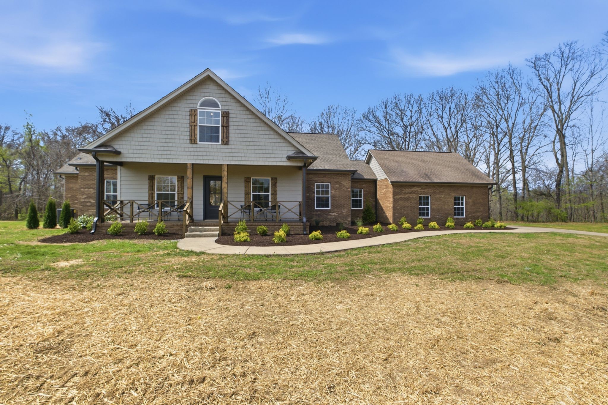 2113 Hanah Court Spring Hill, TN 37174 - Photo 1 of 36 a front view of a house with swimming pool having outdoor seating