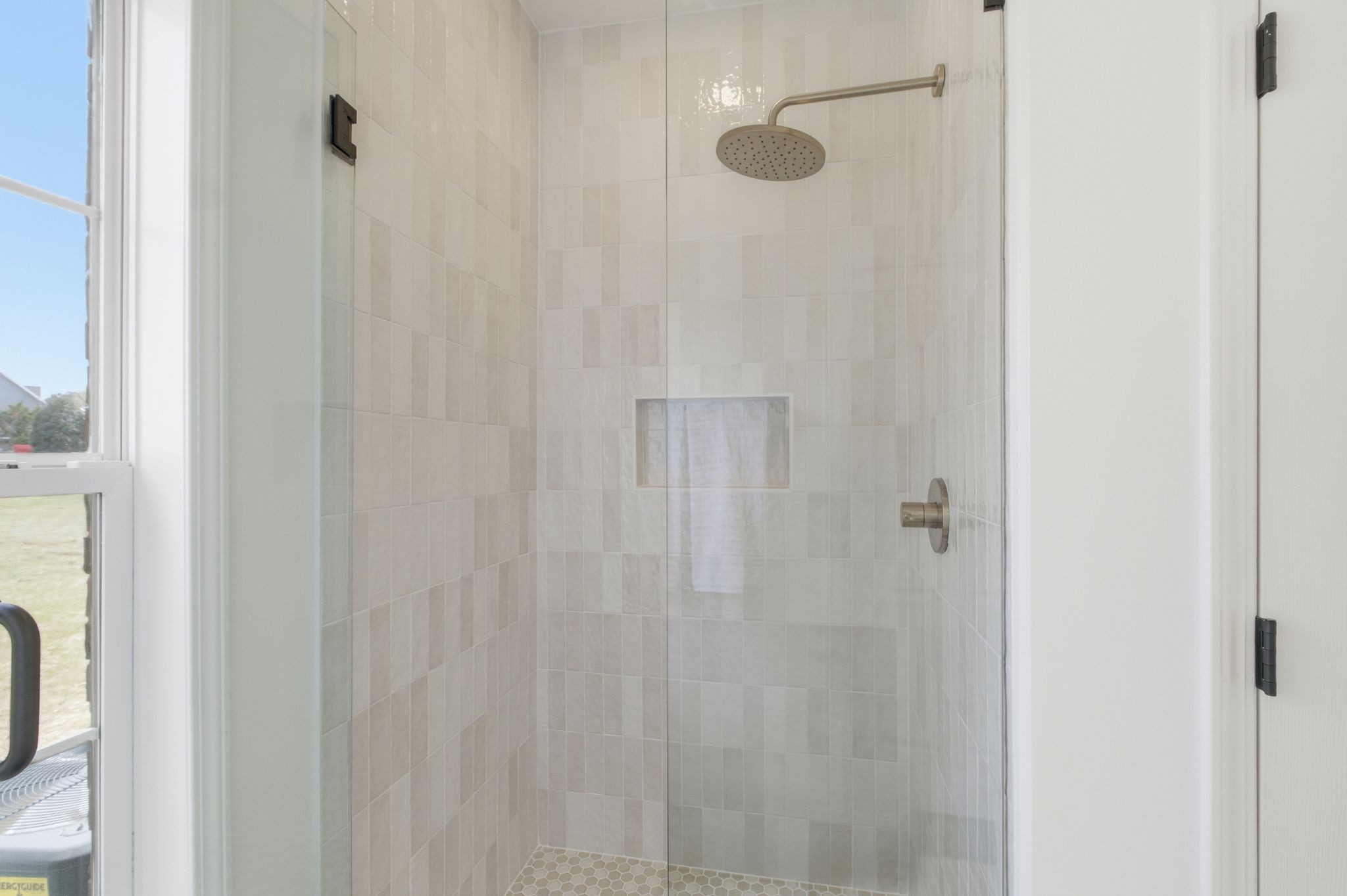 2113 Hanah Court Spring Hill, TN 37174 - Photo 18 of 36 a bathroom with a shower