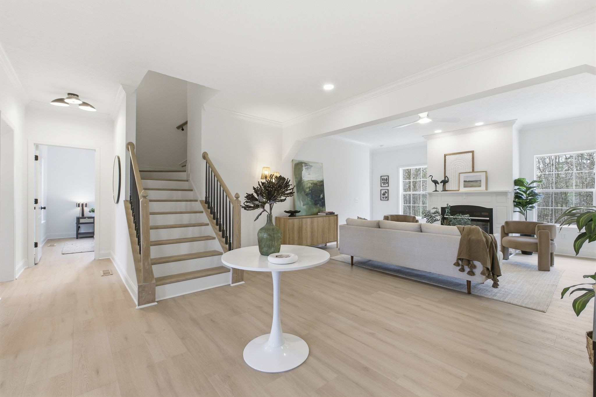 2113 Hanah Court Spring Hill, TN 37174 - Photo 19 of 36 a living room with furniture and a dining table with kitchen view
