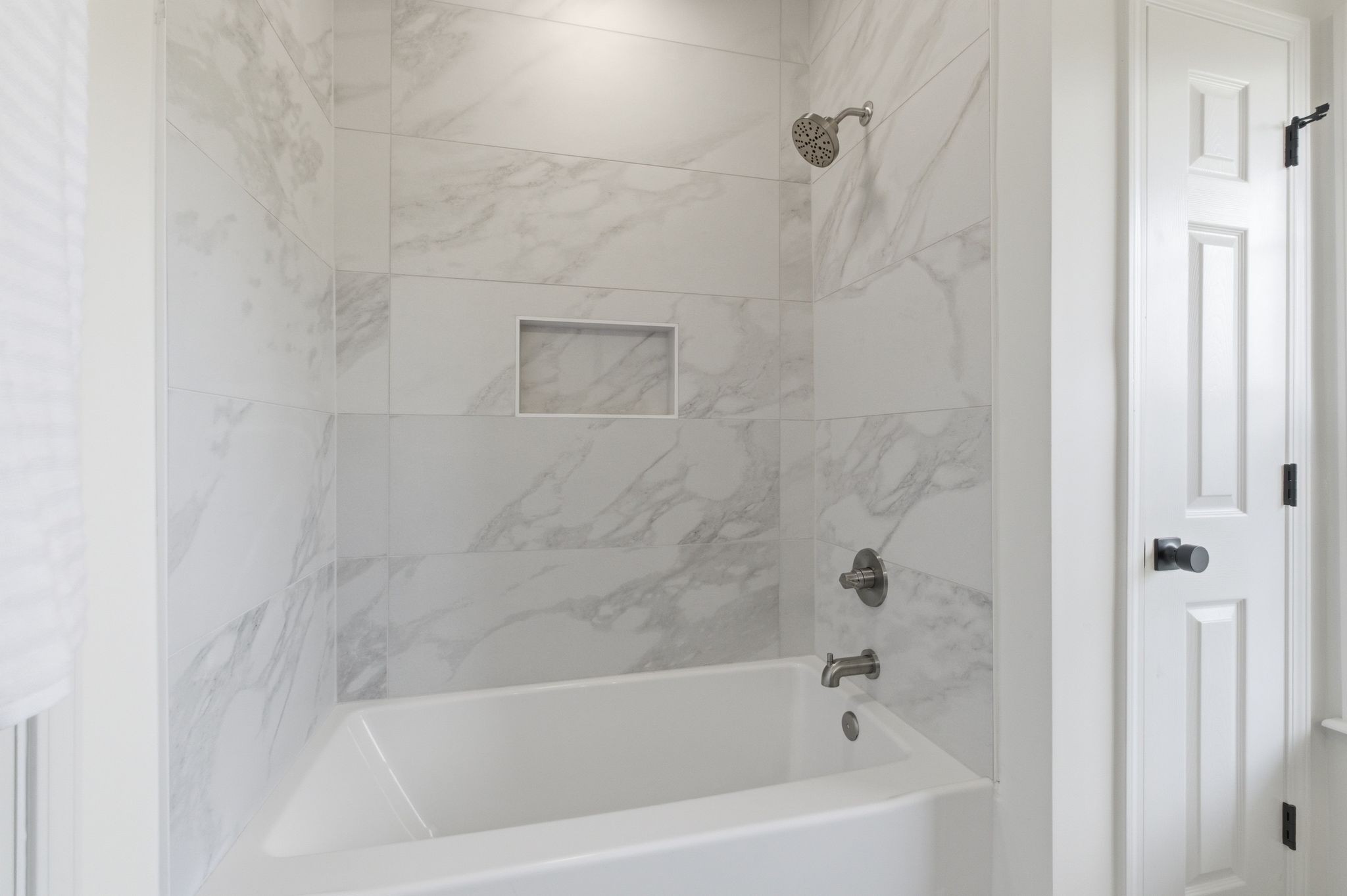 2113 Hanah Court Spring Hill, TN 37174 - Photo 22 of 36 a bathroom with a bathtub