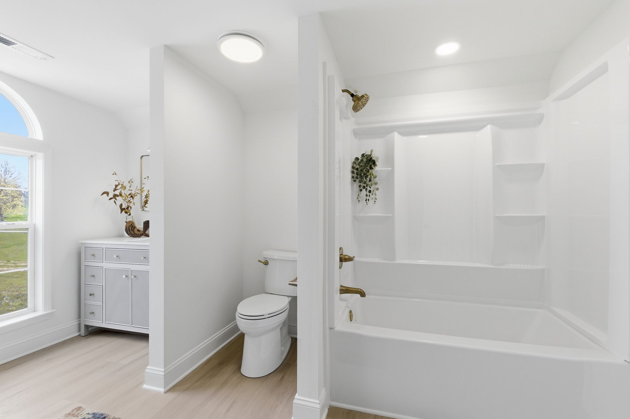 2113 Hanah Court Spring Hill, TN 37174 - Photo 27 of 36 a bathroom with a bathtub toilet and sink