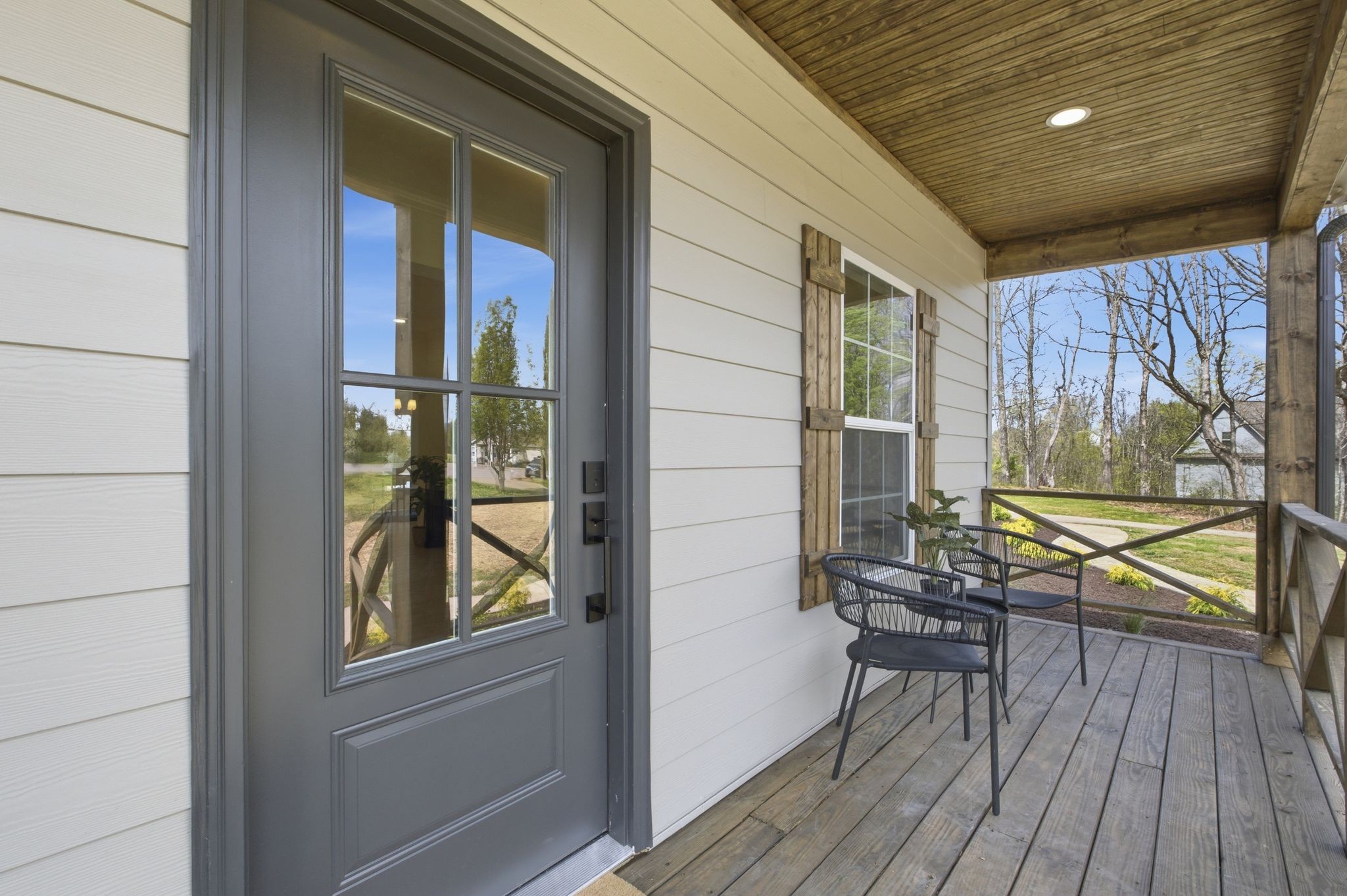 2113 Hanah Court Spring Hill, TN 37174 - Photo 4 of 36 a balcony with chairs and wooden floor