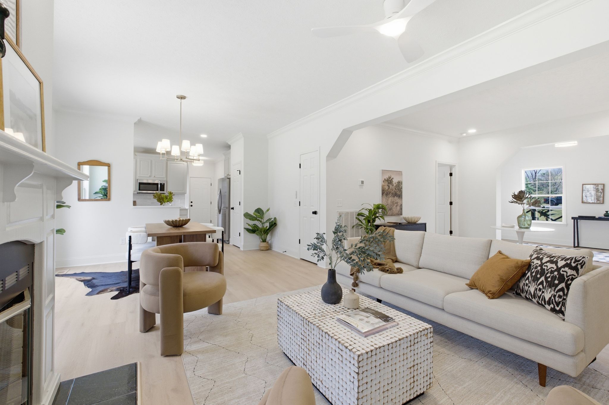 2113 Hanah Court Spring Hill, TN 37174 - Photo 8 of 36 a living room with furniture and a chandelier