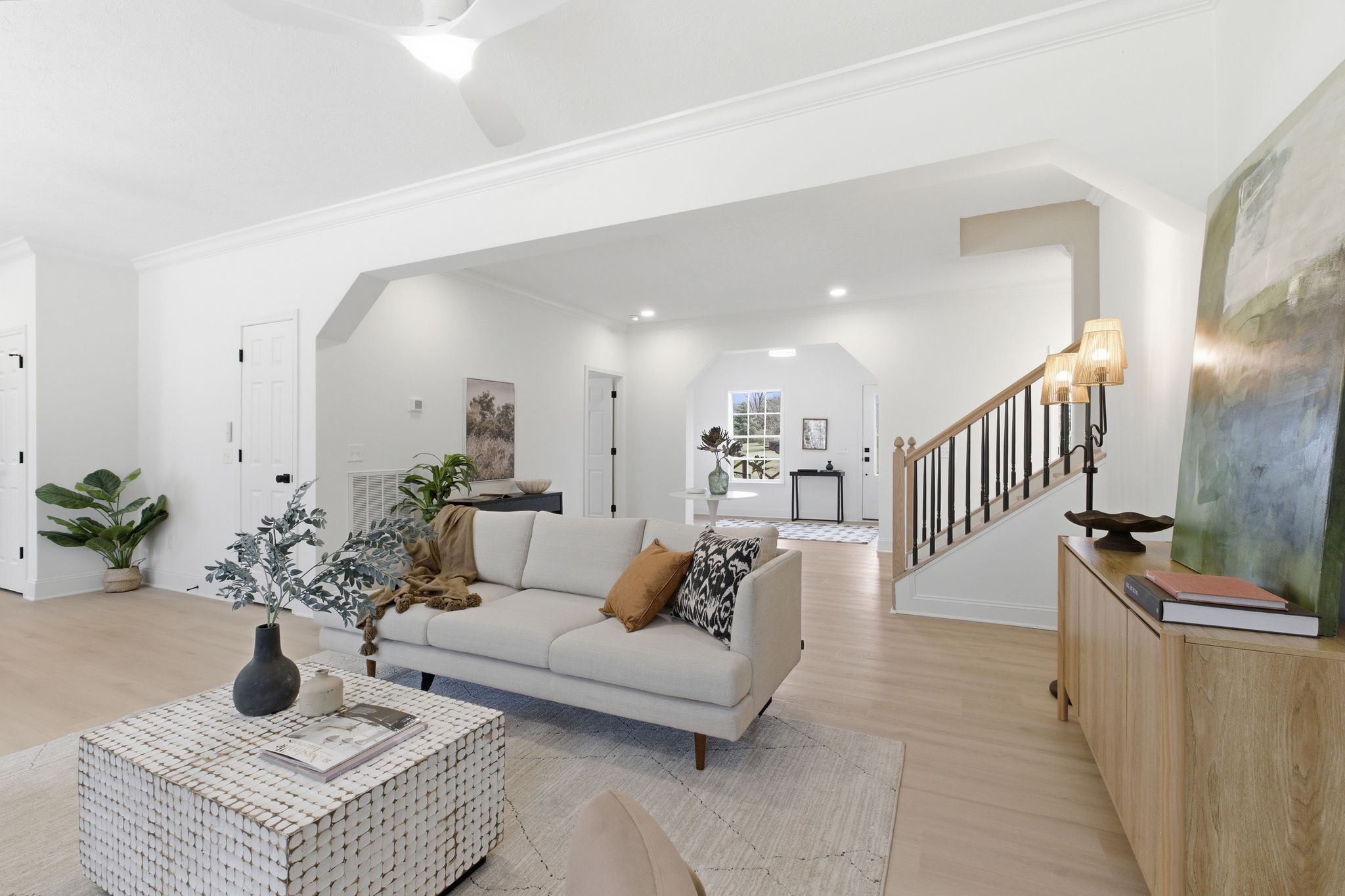 2113 Hanah Court Spring Hill, TN 37174 - Photo 9 of 36 a living room with furniture and a potted plant