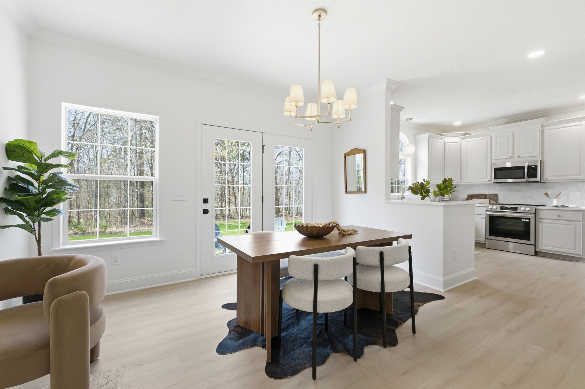 2113 Hanah Court Spring Hill, TN 37174 - Photo 10 of 36 a view of a dining room with furniture window and outside view