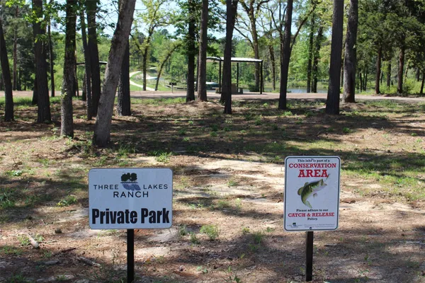 a sign broad on the side of the road