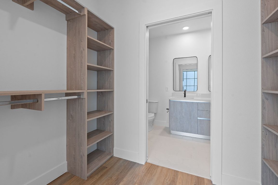 4315 South Congress Avenue, Unit 313 Austin, TX 78745 - Photo 11 of 38 a view of walk in closet with empty racks