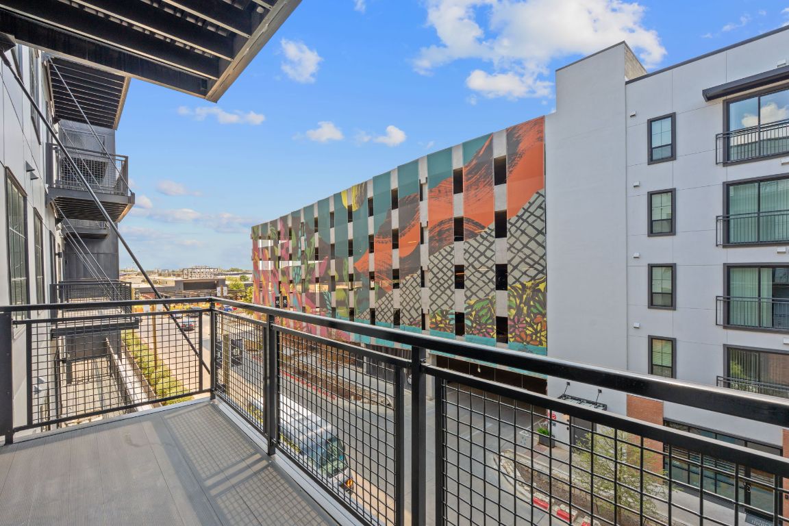 4315 South Congress Avenue, Unit 313 Austin, TX 78745 - Photo 17 of 38 a view of balcony with wooden floor