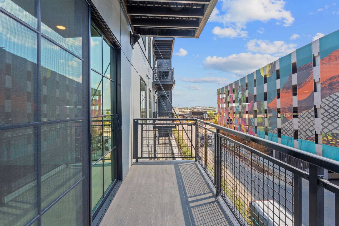 4315 South Congress Avenue, Unit 313 Austin, TX 78745 - Photo 18 of 38 a city view from a balcony