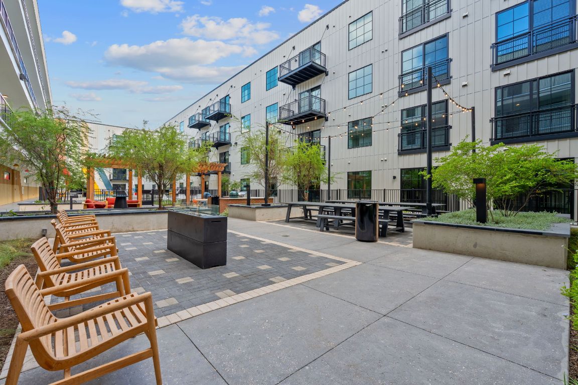 4315 South Congress Avenue, Unit 313 Austin, TX 78745 - Photo 32 of 38 a view of a building with sitting area