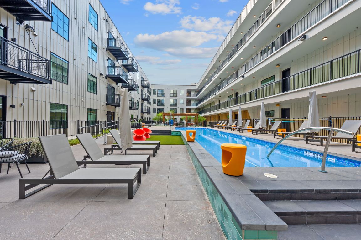 4315 South Congress Avenue, Unit 313 Austin, TX 78745 - Photo 34 of 38 a stairs and bench sitting in front of building