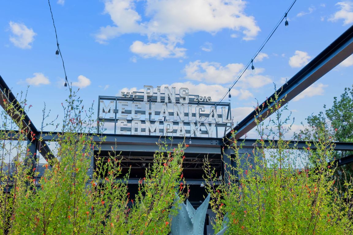 4315 South Congress Avenue, Unit 313 Austin, TX 78745 - Photo 35 of 38 a view of a swimming pool with a yard in back