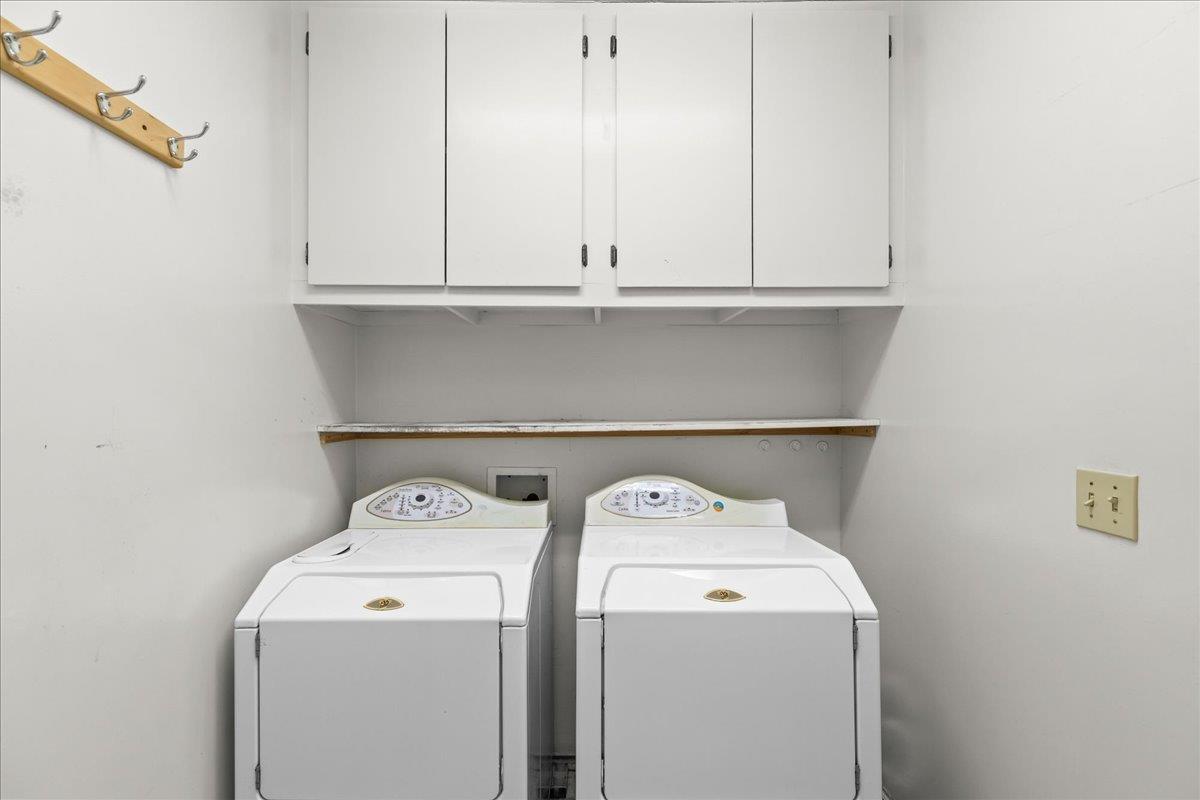 4701 Lone Tree Road Valley Home, CA 95361 - Photo 28 of 59 a utility room with dryer and washer