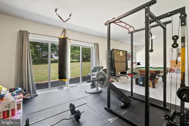 a room with lots of furniture and windows