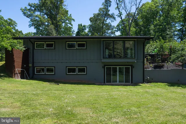 a backyard of a house with lots of green space