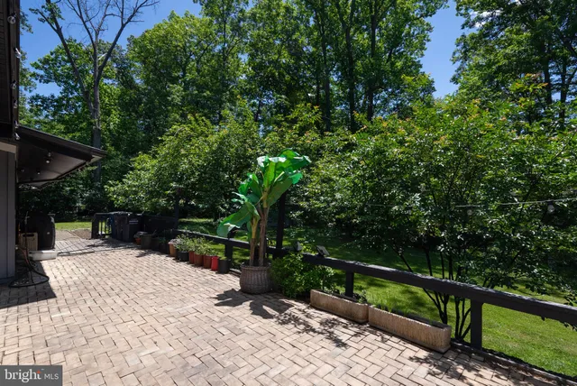 a view of backyard with green space