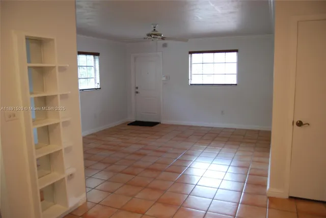 an empty room with windows