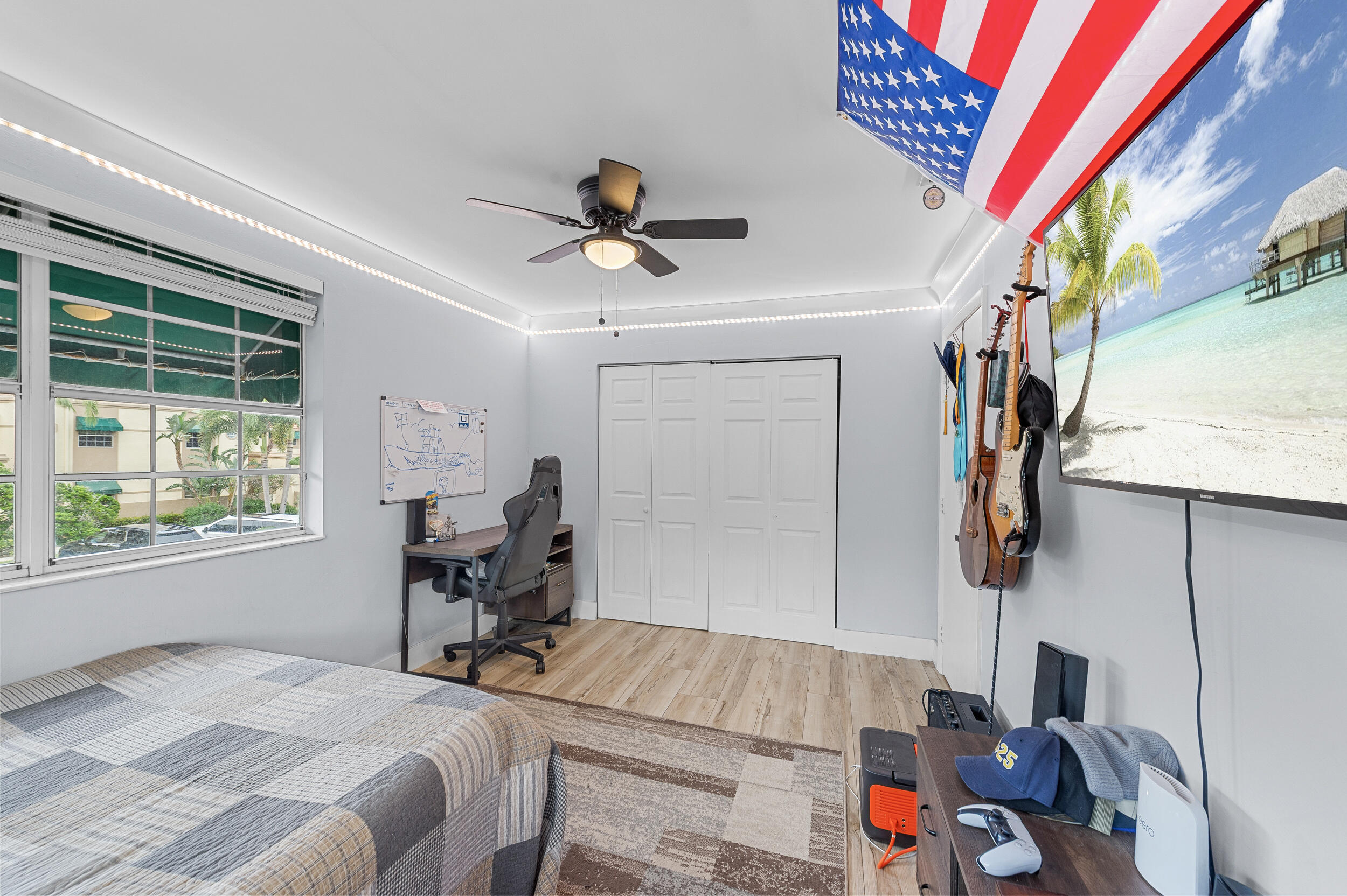 6548 Via Regina Boca Raton, FL 33433 - Photo 22 of 41 a bed room with a bed and a window