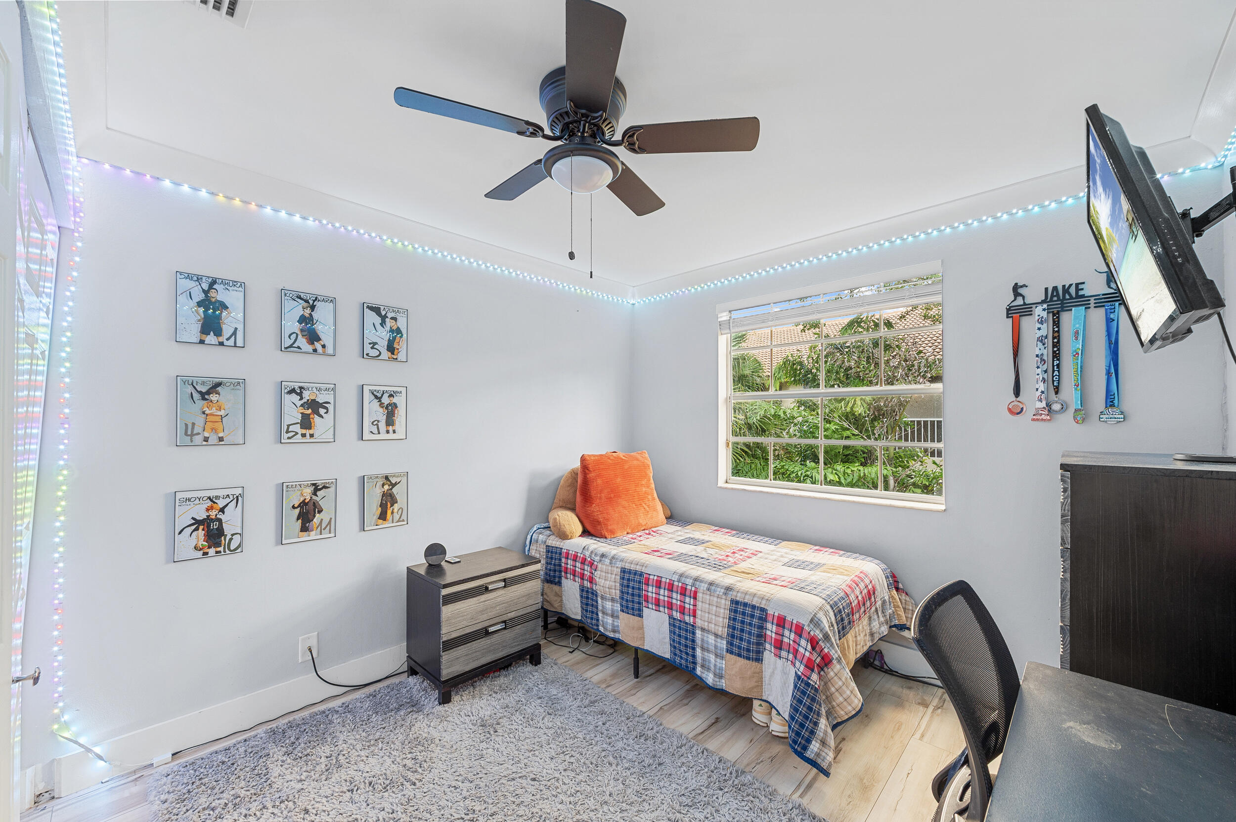 6548 Via Regina Boca Raton, FL 33433 - Photo 24 of 41 a bedroom with furniture and a window