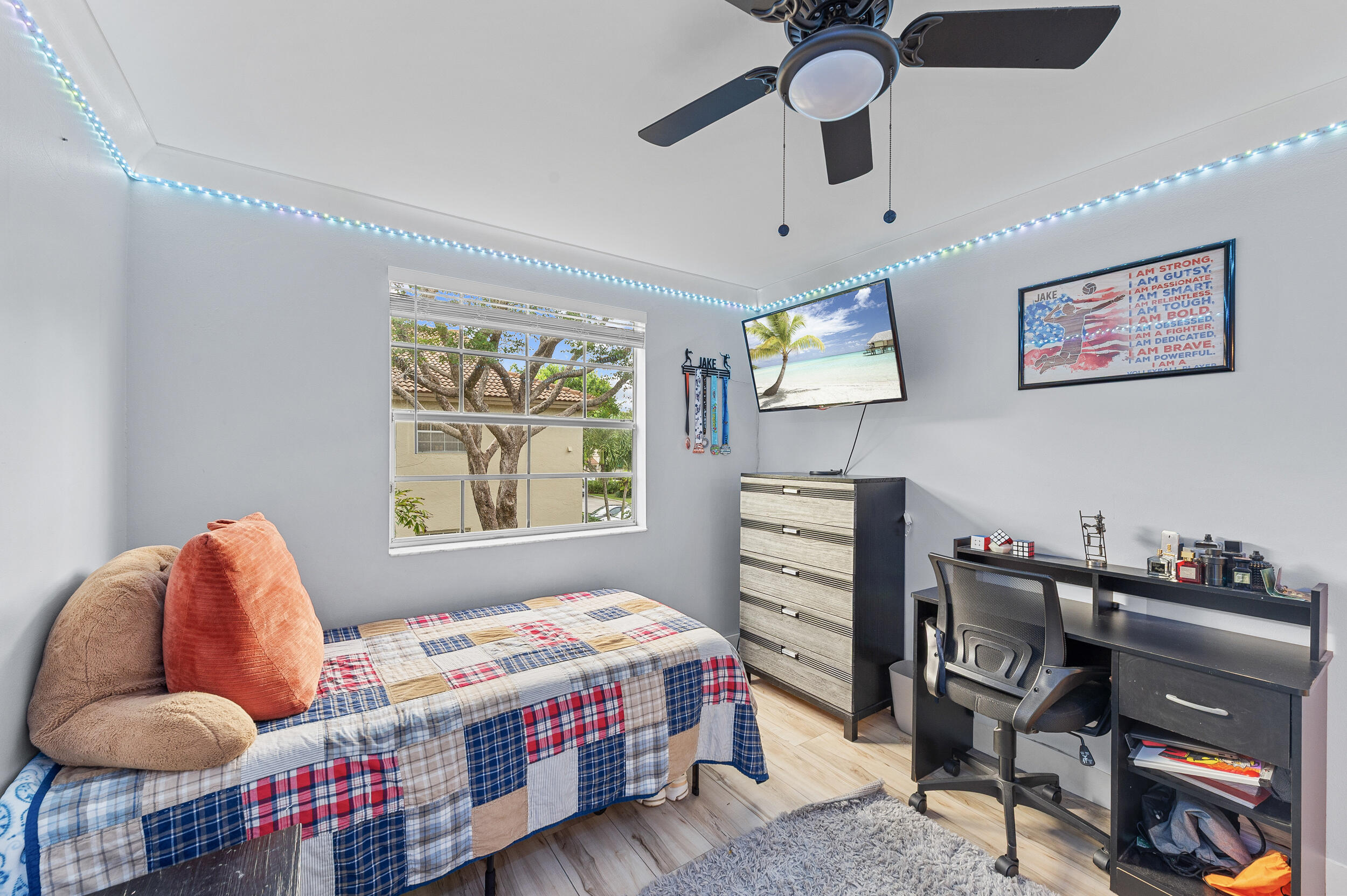 6548 Via Regina Boca Raton, FL 33433 - Photo 25 of 41 a bedroom with furniture and wooden floor