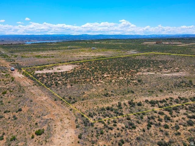 4500 South 22750th Duchesne, UT 84021 - Photo 14 of 34 Expansive vacant land parcel featuring arid vegetation and distant mountainous terrain
