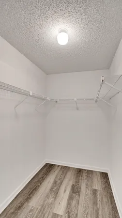 a view of a room with racks on the wall