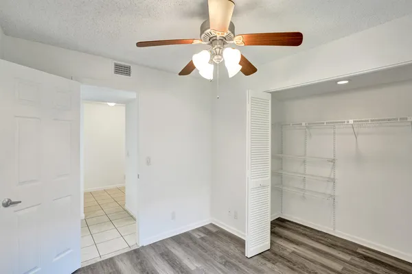 a view of entryway with wooden floor