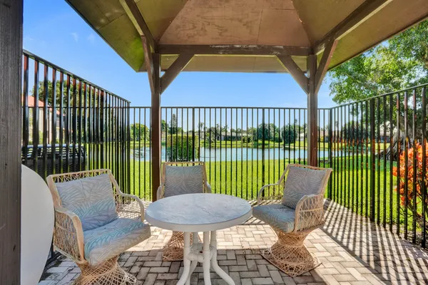 a view of a lake with a yard