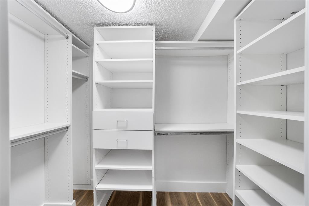 21905 Lake Forest Circle, Unit 101 Boca Raton, FL 33433 - Photo 11 of 23 a view of walk in closet with empty racks