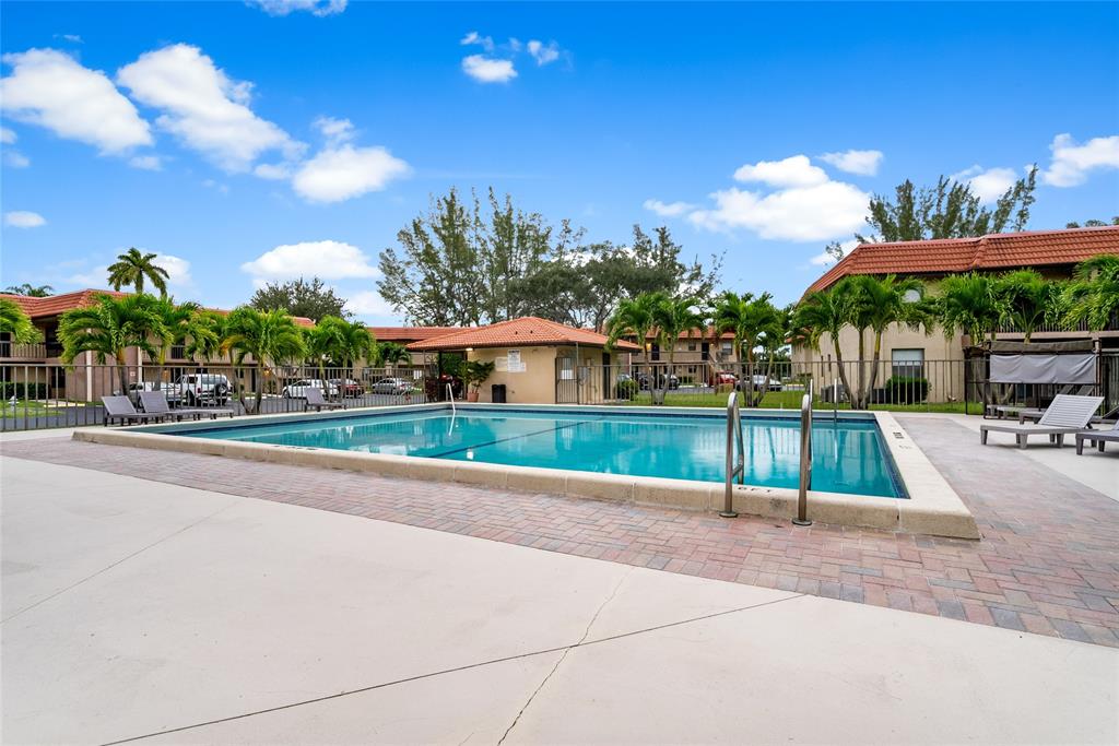 21905 Lake Forest Circle, Unit 101 Boca Raton, FL 33433 - Photo 18 of 23 a view of a volley ball court