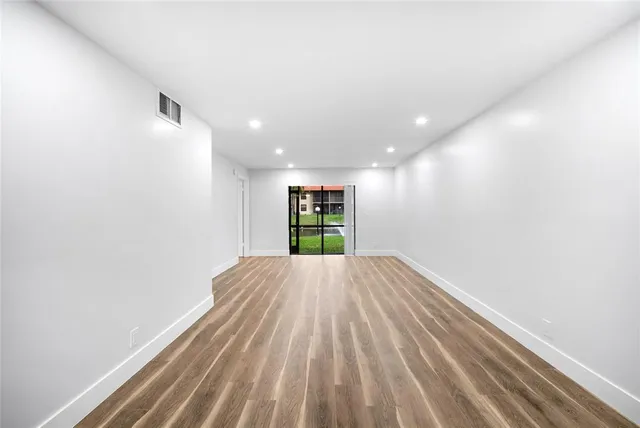 a view of an empty room and window