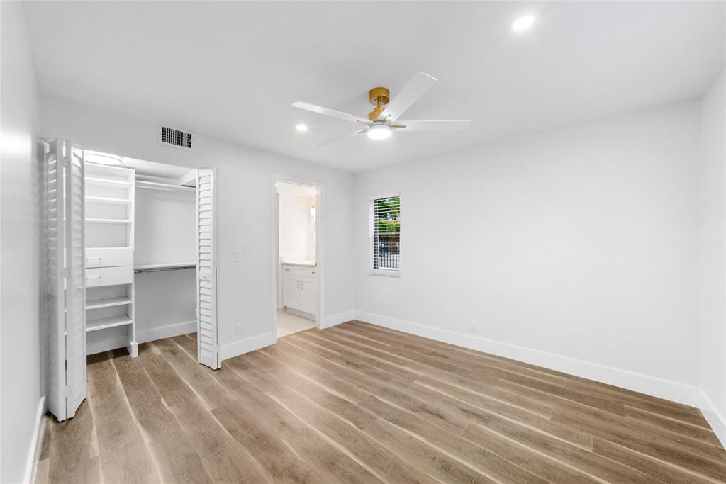 21905 Lake Forest Circle, Unit 101 Boca Raton, FL 33433 - Photo 9 of 23 wooden floor in an empty room