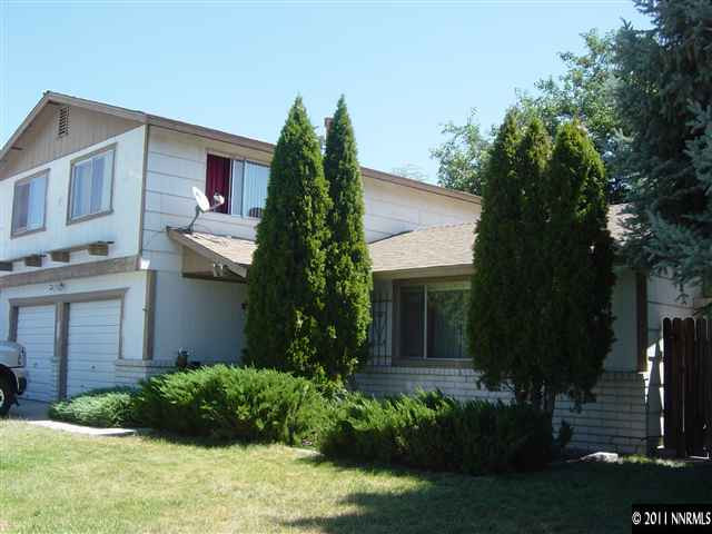 2830 Santa Ana Drive Reno, NV 89502 - Photo 1 of 12 a front view of a house with garden