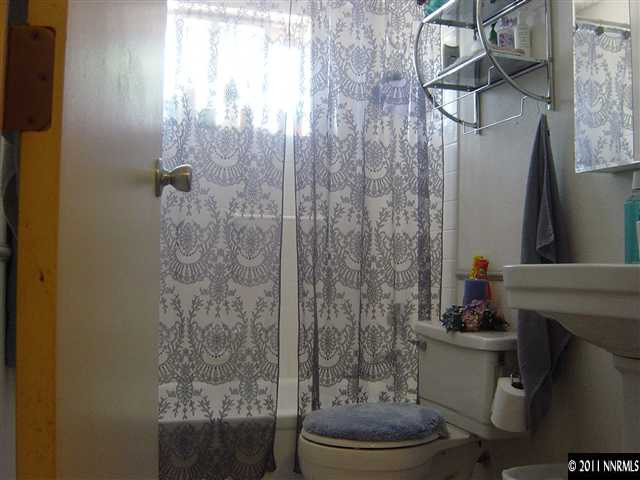 2830 Santa Ana Drive Reno, NV 89502 - Photo 5 of 12 a bathroom with a toilet and a shower