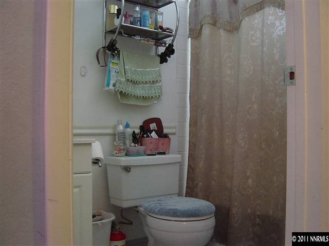2830 Santa Ana Drive Reno, NV 89502 - Photo 9 of 12 a bathroom with a toilet and a sink