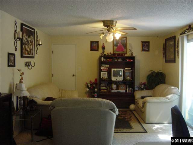 2830 Santa Ana Drive Reno, NV 89502 - Photo 10 of 12 a room with table chairs and a chandelier