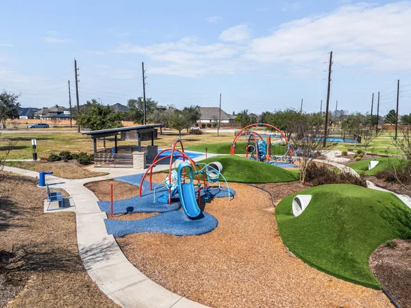 a view of a lake with a table and chairs