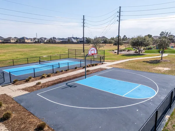 a view of a swimming pool with a lounge chair