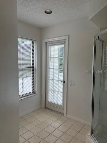 an empty room with windows