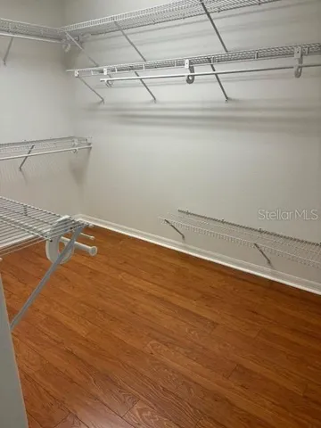 a view of a room with racks on the wall