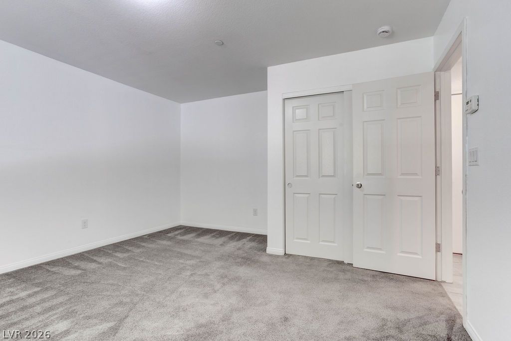 4650 Ranch House Road, Unit 47 North Las Vegas, NV 89031 - Photo 34 of 43 An inviting room boasts fresh, clean carpeting and ample closet space.