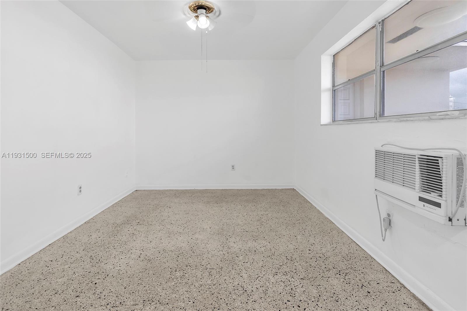 644 Southwest 10th Street, Unit 5 Miami, FL 33130 - Photo 23 of 26 an empty room with cabinet