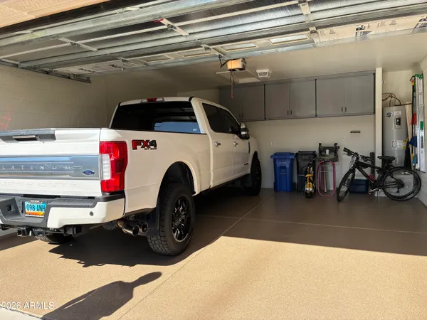 a view of a house with backyard and porch